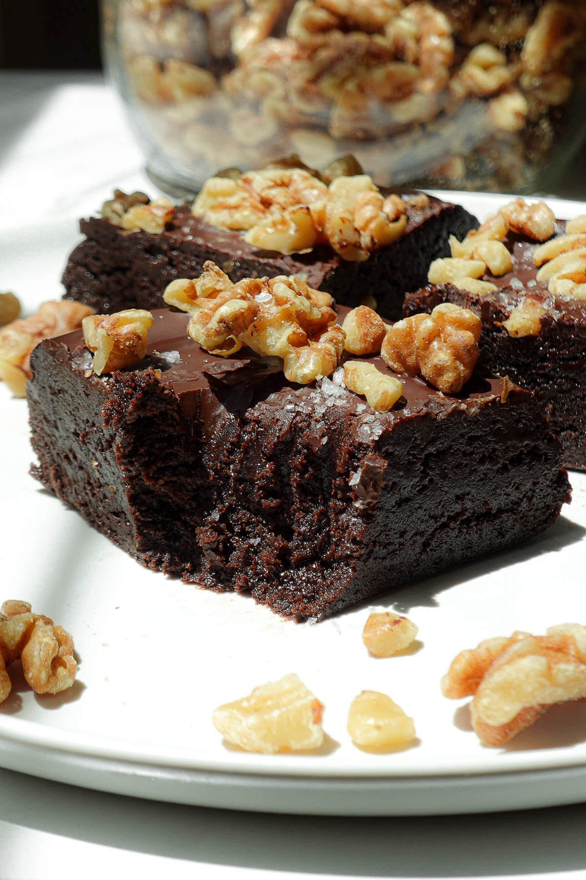 Close up of fudgy no-bake brownies made from walnuts and dates.